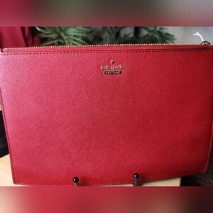 Kate Spade Red thin clutch NWOT 11w x7h
